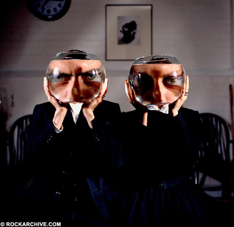 A Rockarchive limited edition print by Storm Thorgerson featuring two people with fishbowls over their faces used on Pink Floyd's live single of "Wish You Were Here".