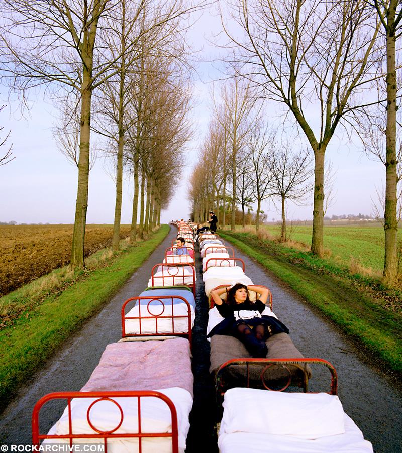 A Rockarchive limited edition print of Storm Thorgerson's alternative artwork for Pink Floyd's "A Momentary Lapse of Reason" featuring a line of beds.