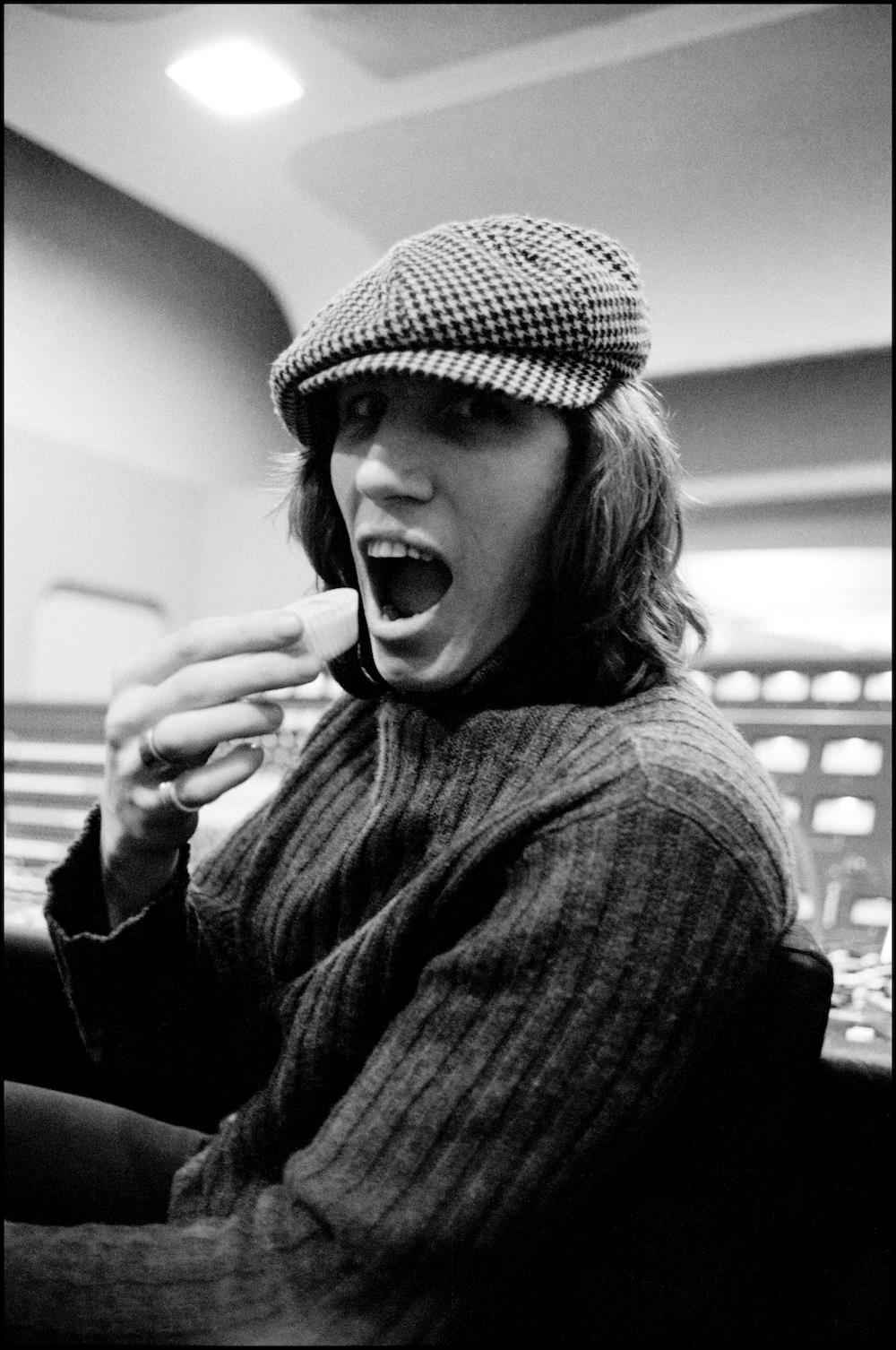 A Rockarchive limited edition print of Roger Waters about to eat a cupcake.