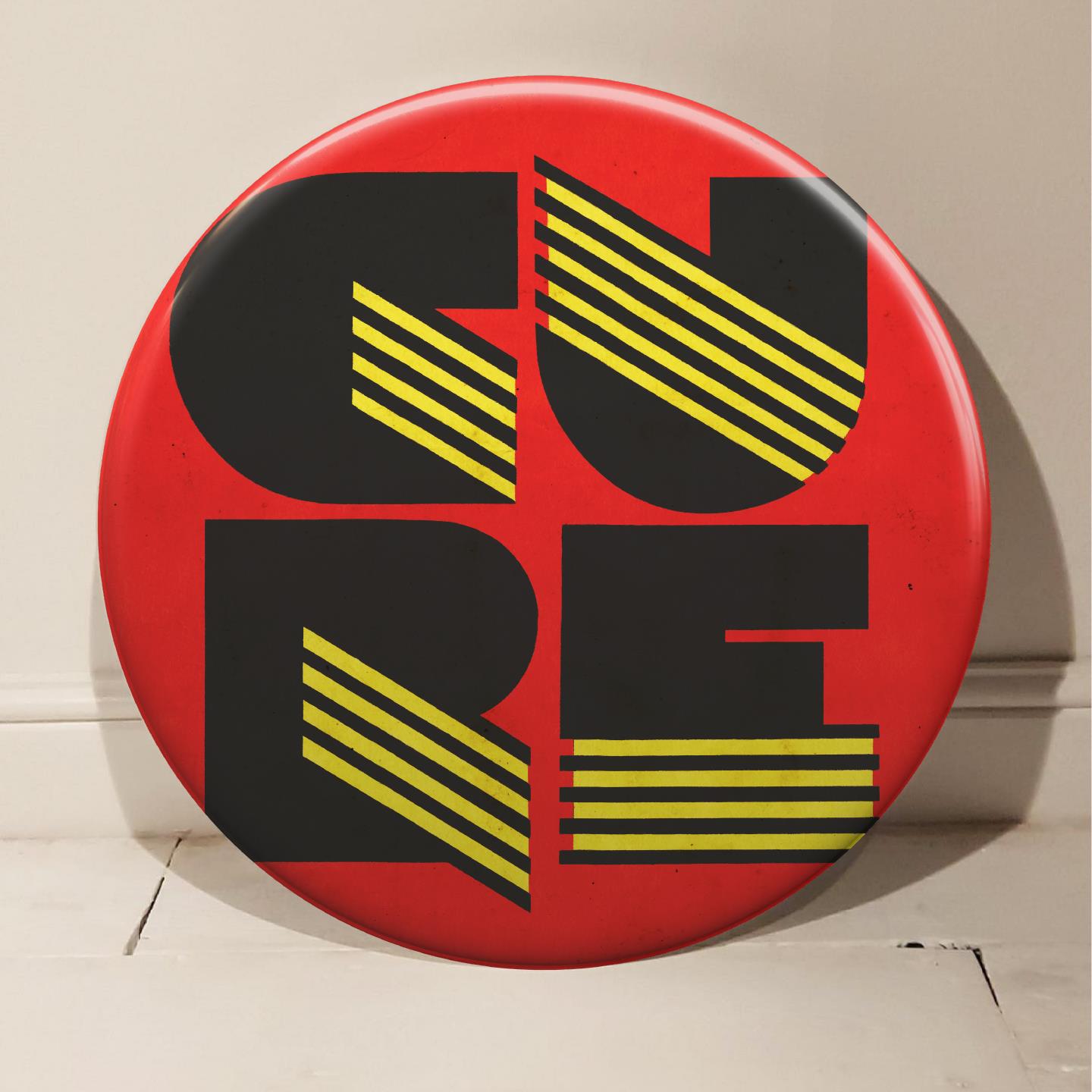 The Cure giant pin badge designed by Tony Dennis AKA Tape Deck Art