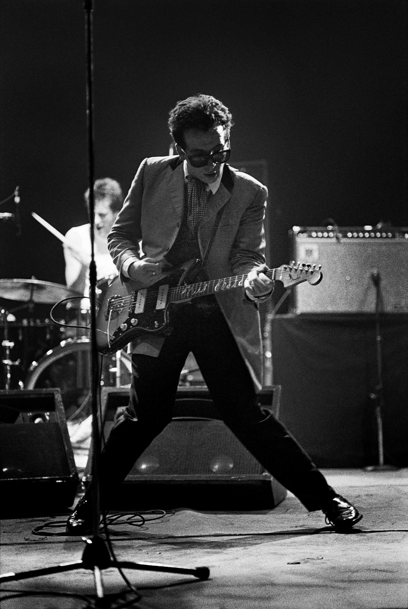 Elvis Costello onstage at Berklee College of Music in Boston, USA in 1980 photographed by Michael Grecco