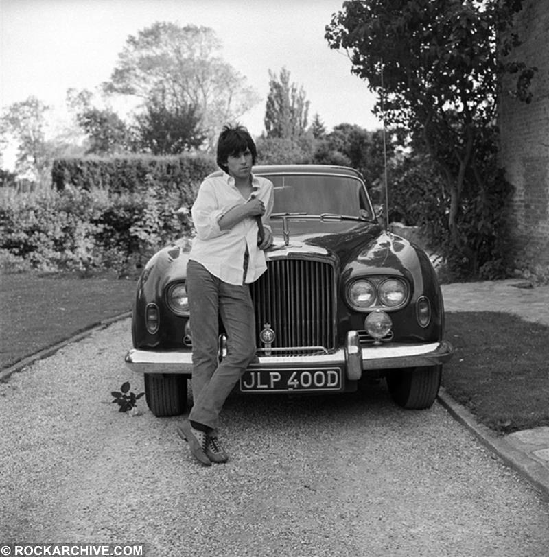 Keith Richards photographed at home with his Bentley in 1966 by Gered Mankowitz