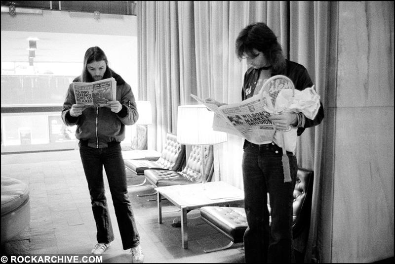 A Rockarchive limited edition print of David Gilmour and Rick Wright reading newspapers in a sports club.
