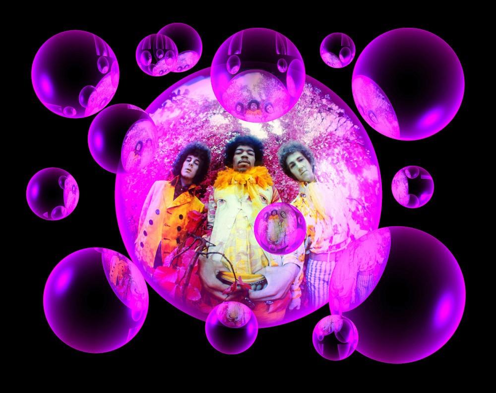 The Jimi Hendrix Experience surrounded by purple bubbles in 1967