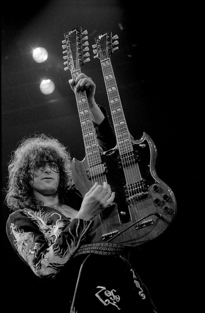 Jimmy Page, Led Zeppelin playing his double next guitar at Earls Court in 1975