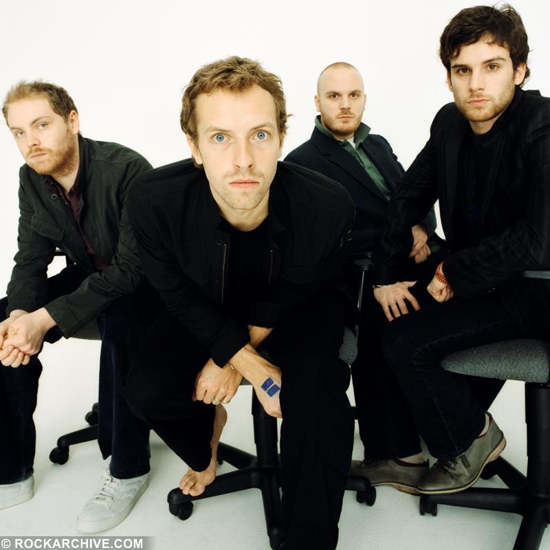 https://www.rockarchive.com/media/4909/coldplay-sat-on-office-chairs-cd002jake.jpg?crop=0.032959789057350058%2C0.18831424402185523%2C0.0400461437046795%2C0.061761775360137237&cropmode=percentage&height=800&overlay=watermark.png&overlay.position=0%2C780&overlay.size=230%2C20&rnd=133611244910000000&width=800