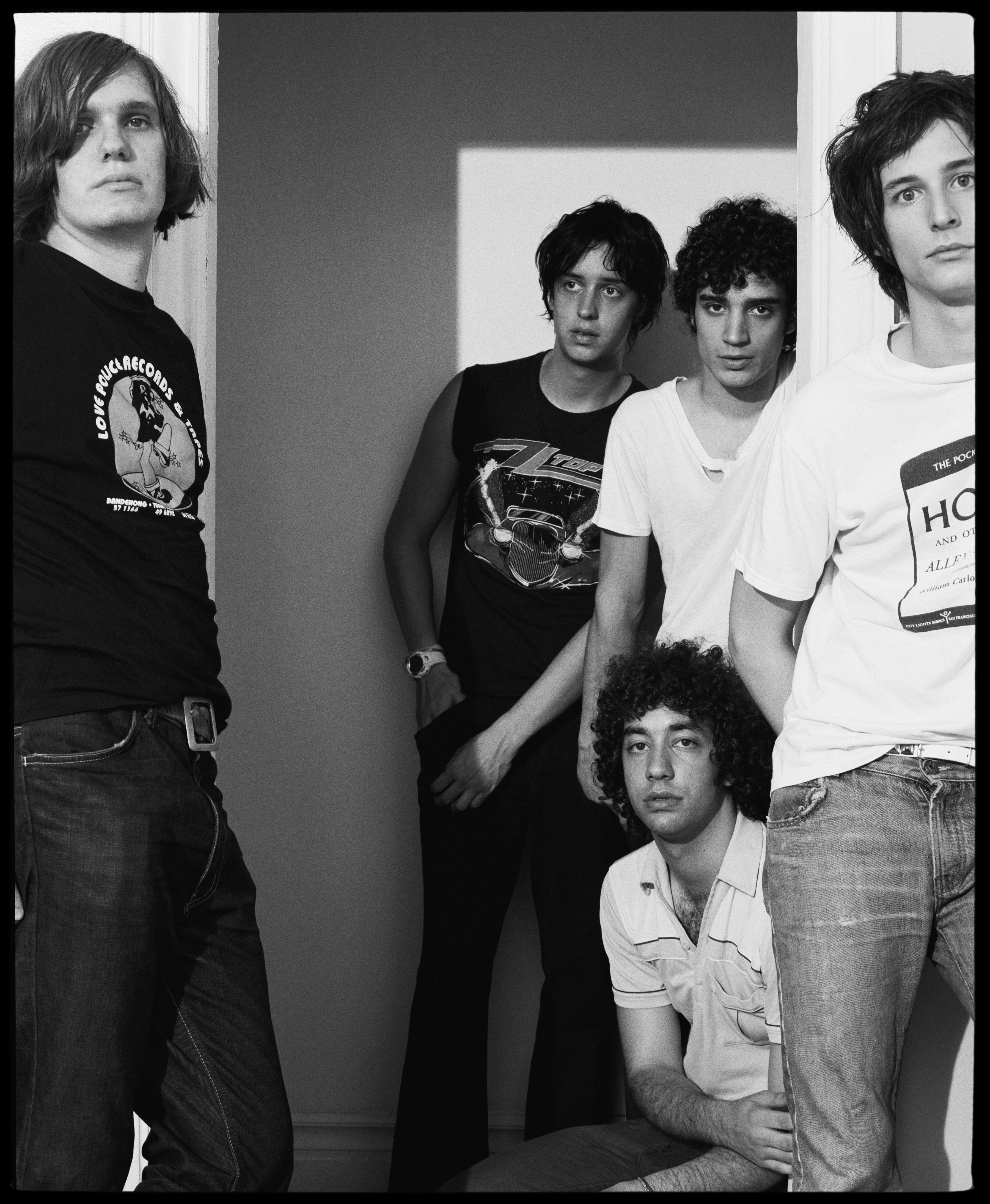 Limited edition print of The Strokes stoor in a doorway in 2003.