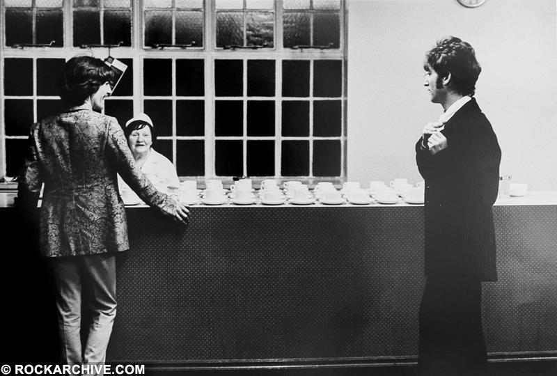 Limited edition print of John Lennon & George Harrison in a canteen in 1967.