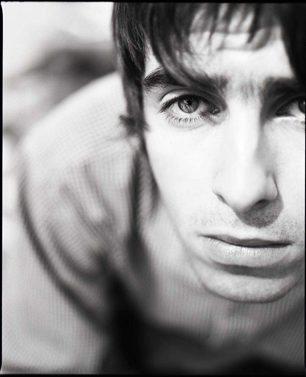 A limited edition print of Liam Gallagher starring down the camera.
