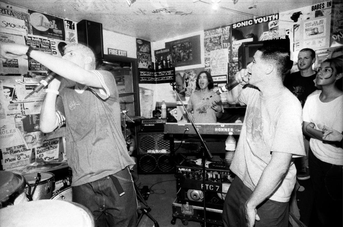 A limited edition print of the Beastie Boys performing in the basement of Slam City Skates, London in 1994.