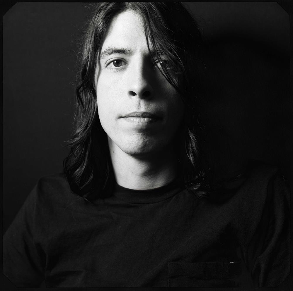 A limited edition portrait print of Dave Grohl cast in shadow.