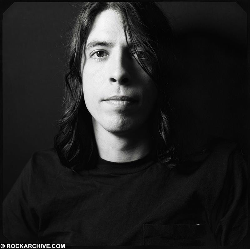 A limited edition portrait print of Dave Grohl cast in shadow.