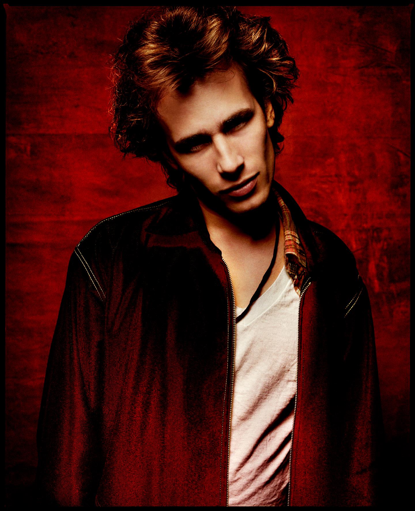 A limited edition colour print of Jeff Buckley wearing a red jacket and white shirt in 1993