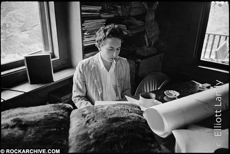 A fine art peint of Bob Dylan playing guitar at his Byrdcliffe home in 1968.