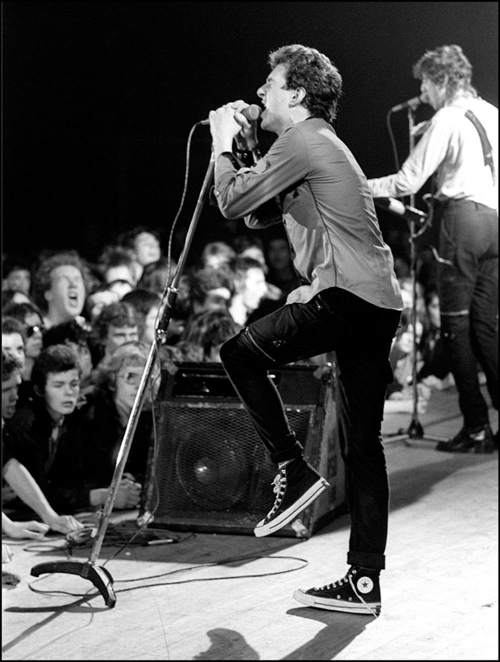 A limited edition Rockarchive print of The Clash performing onstage in 1977.