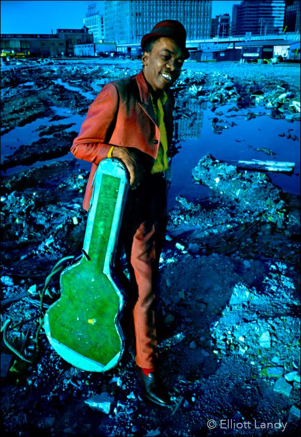 A limited edition colour print of John Lee Hooker stood in New York City.