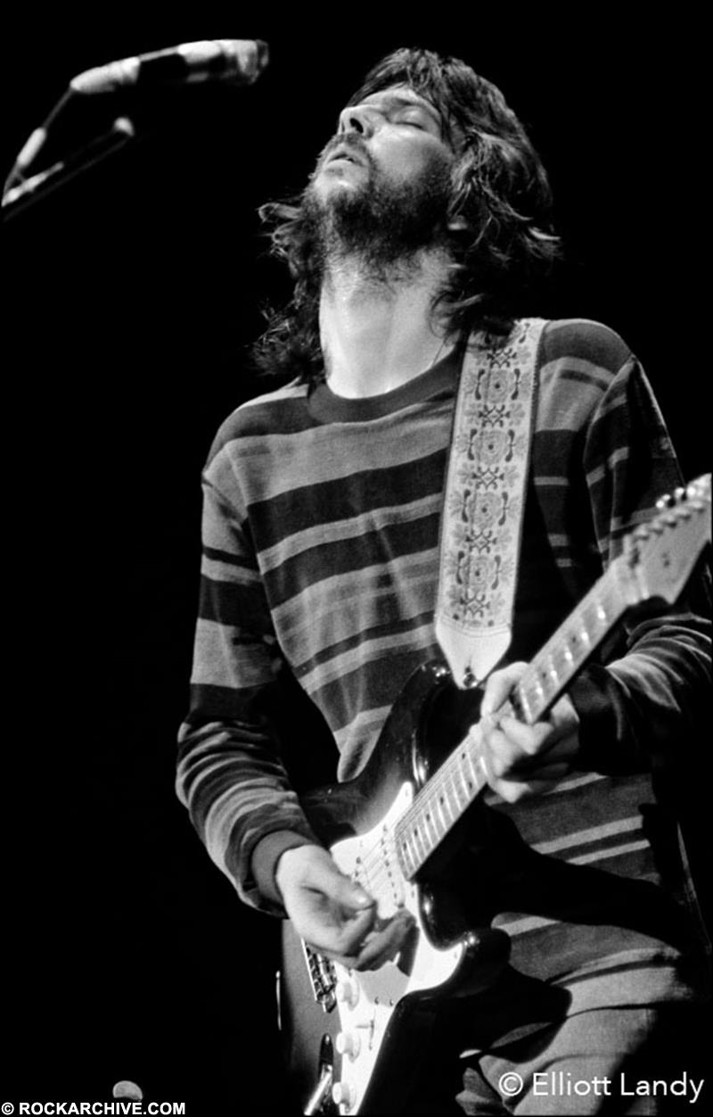 A fine art print of Eric Clapton playing guitar.