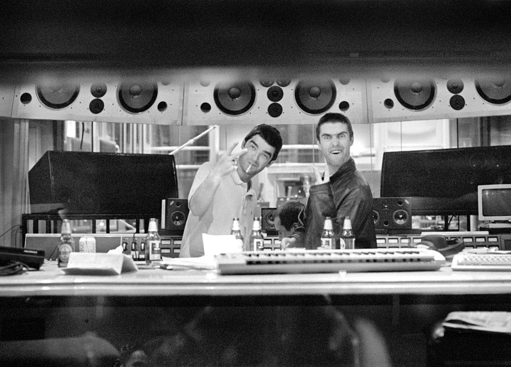 A limited edition print of Noel & Liam Gallagher making V signs whilst stood in Air Studios in 1997.