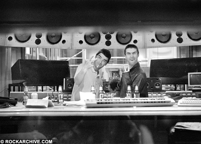 A limited edition print of Noel & Liam Gallagher making V signs whilst stood in Air Studios in 1997.