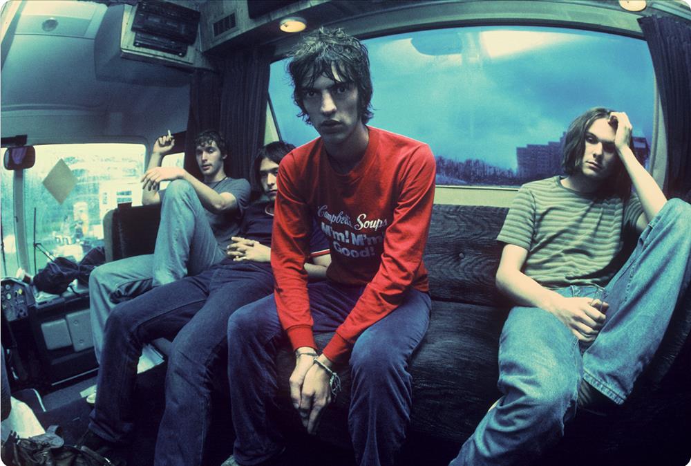 A limited edition colour print of The Verve sat on their tour bus in 1994.