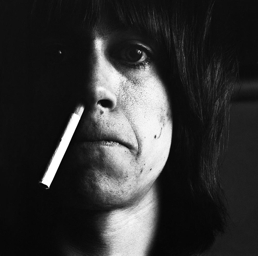 A limited edition print of Iggy Pop photographed with a cigarette up his nose.
