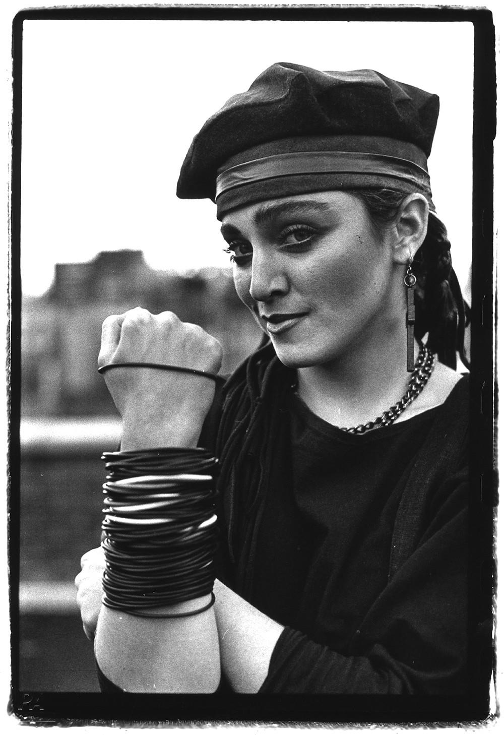 A limited edition print of Madonna making a hand gesture.