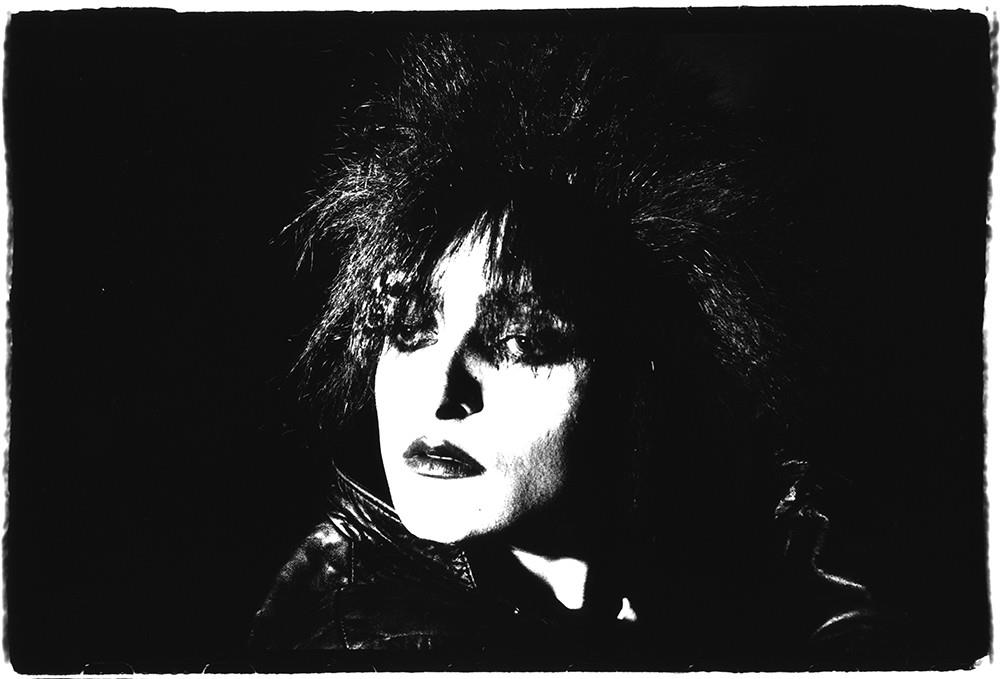 Limited edition print of a Siouxsie Sioux portrait shot in hard black and whites.