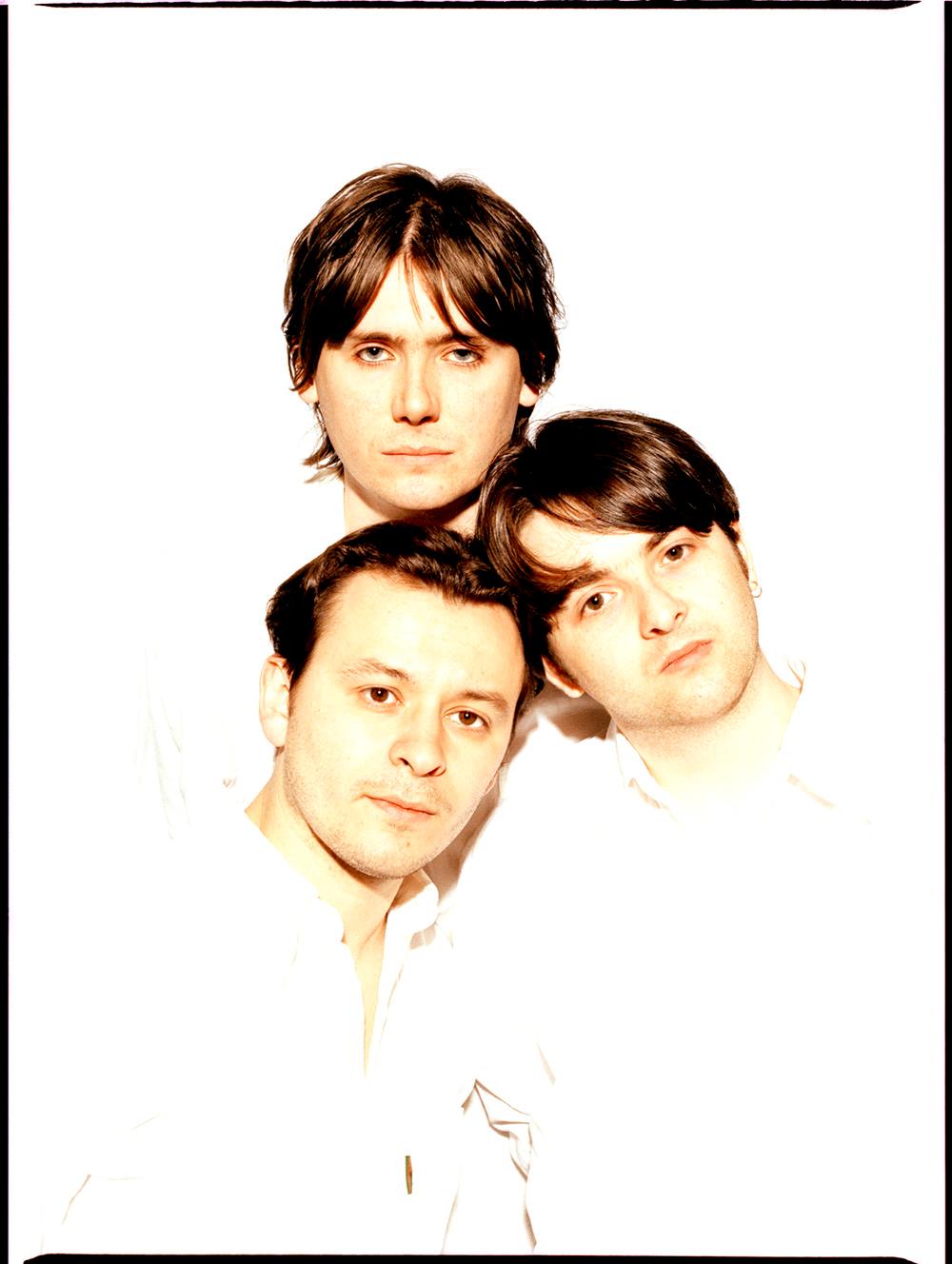 A Rockarchive fine art print of the Manic Street Preachers against a white background.
