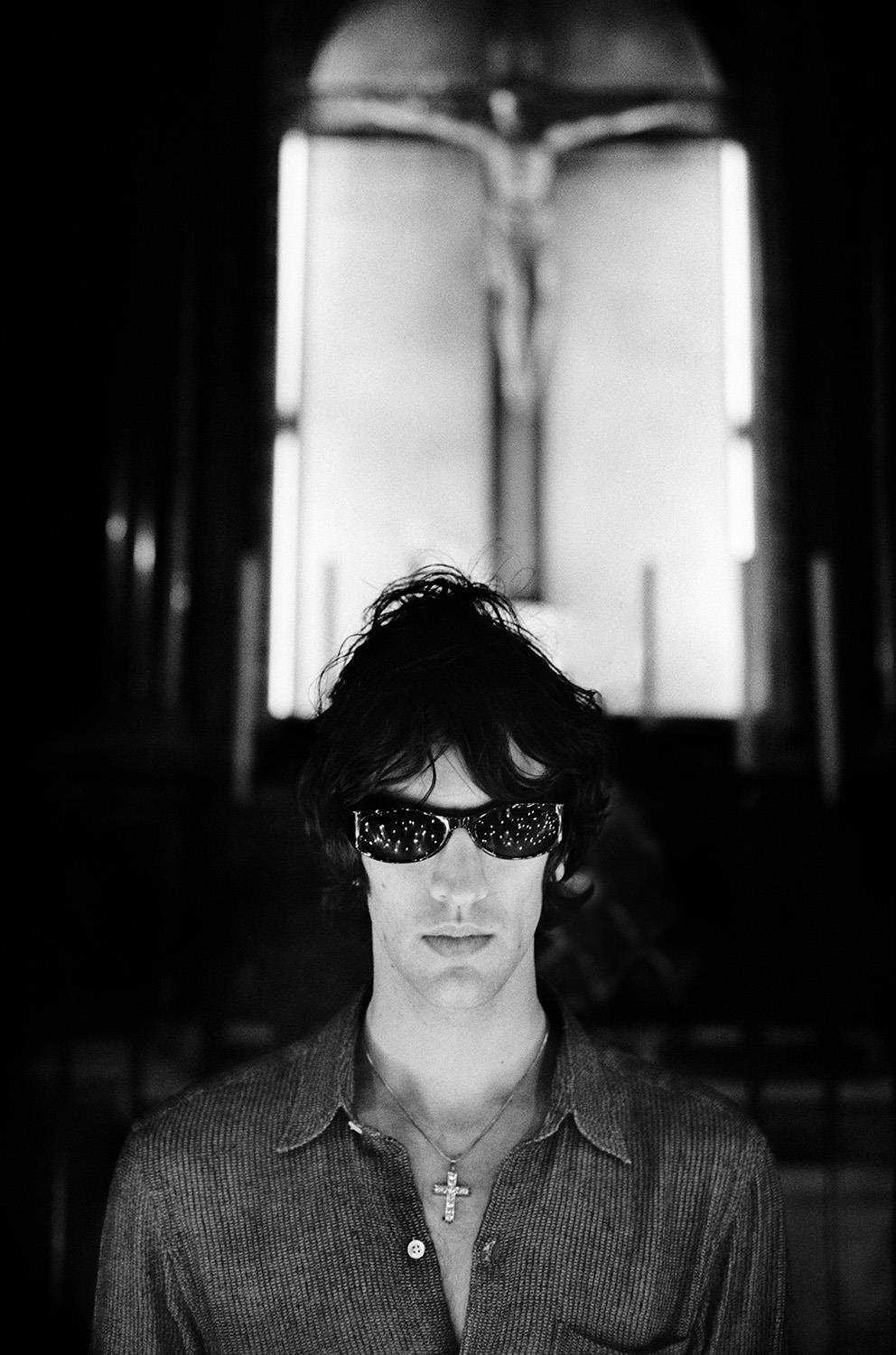 A Rockarchive limited edition print of Richard Ashcroft, The Verve stood in a cathedral.