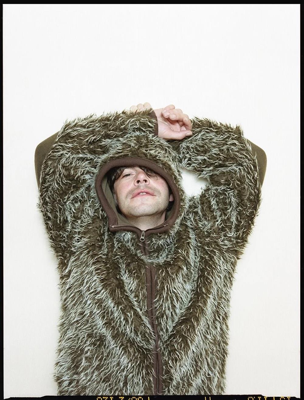 A limited edition colour print of Tim Burgess, The Charlatans with his arms above his head