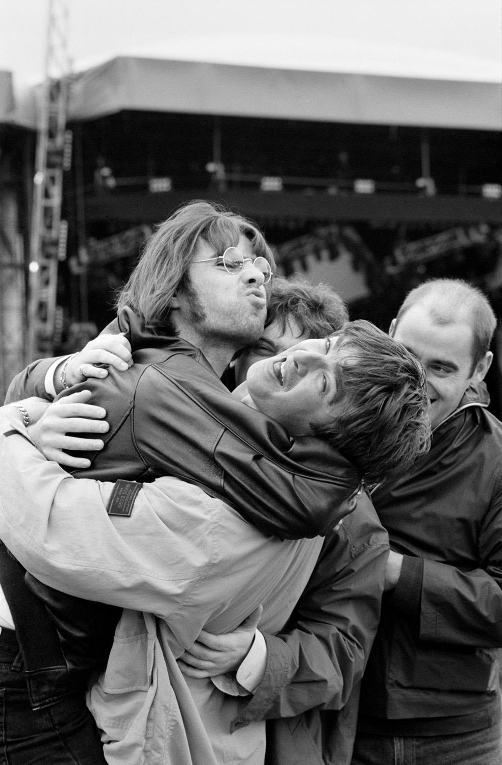 A limited edition print of Noel & Liam Gallagher embracing at Knebworth Park in August 1996.