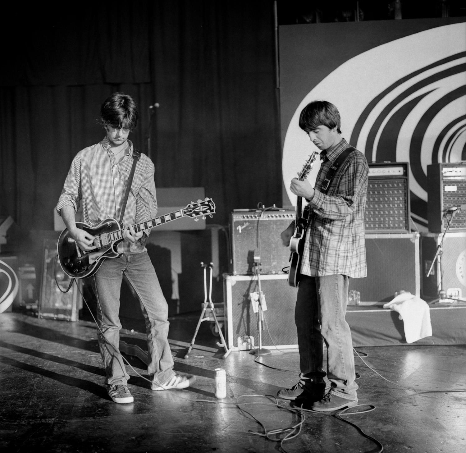 A limited edition print of Noel Gallagher & John Squire rehearsing at the NEC in 1996.