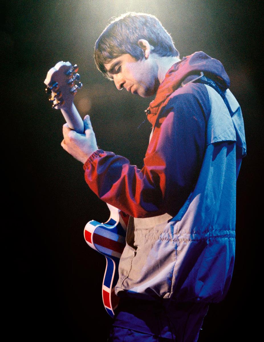A limited edition print of Noel Gallagher, Oasis onstage at Maine Road, Manchester in 1996.