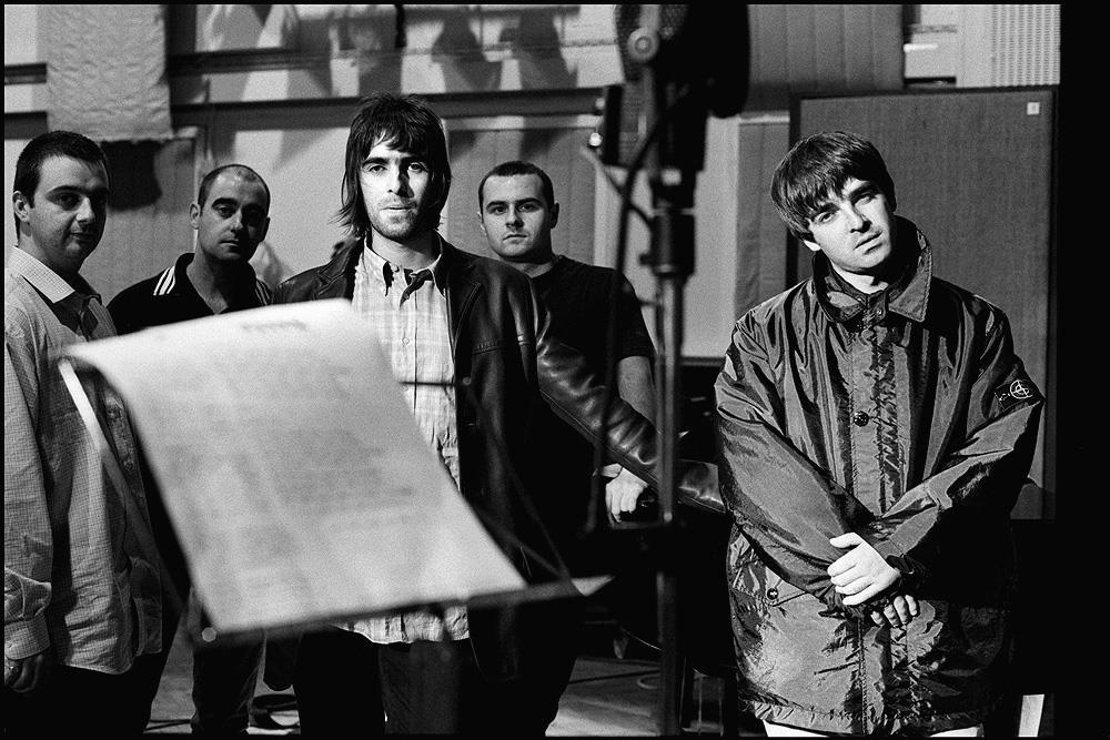 A limited edition print of Oasis taken at Abbey Road Studios during the recording of their album Be Here Now
